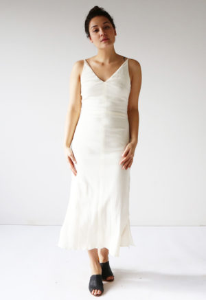 Front view of straight size model wearing Cream Myrtle Dress.
