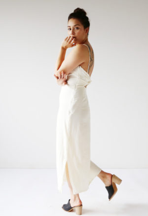 Side view of straight size model wearing Cream Myrtle Dress.