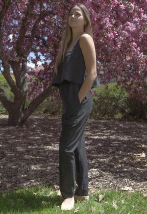 Side view of straight size model in Easy Tapered Pant in Black Lyocell and matching Black Linen Baby Tank