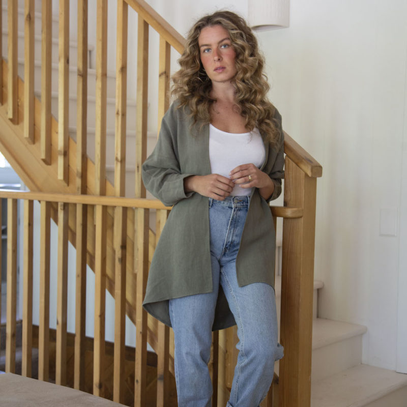Front view of straight size model wearing Easy Jacket in Moss Linen.