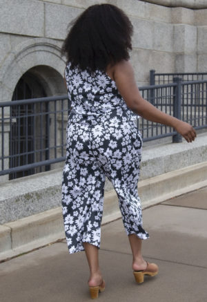 Back view of plus size model wearing Easy Wide-Leg Pant in Jungle Green Floral.