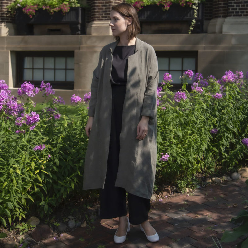 Front view of straight size model wearing Lapel Midi Jacket in Moss Linen.