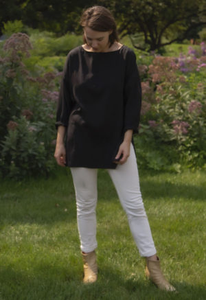 Front view of straight size model wearing Tunic Pullover in Black Lyocell.