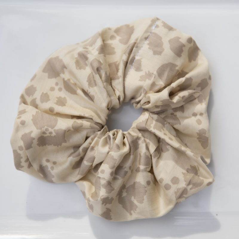 Product shot of Large Scrunchie in Almond Floral.