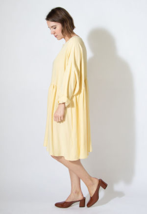 Side view of straight size model wearing Knee Length Gathered in Italian Straw.