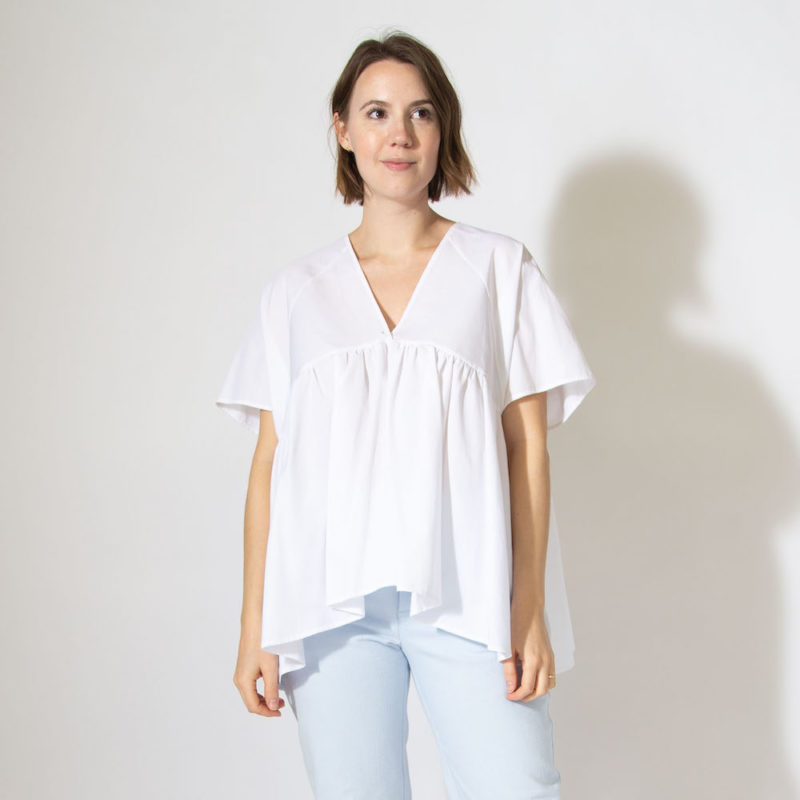 Front view of straight size model wearing Sample 519 in white cotton.