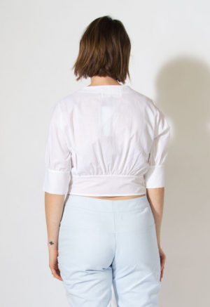 Back view of straight size model wearing sample 517 in white cotton.