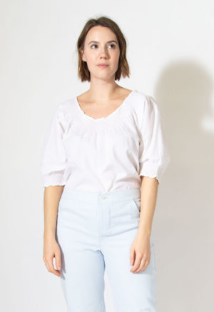 Front view of straight size model wearing Sample 514 in white cotton.