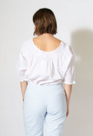 Back view of straight size model wearing Sample 514 in white cotton.