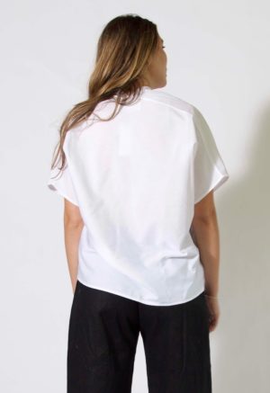 Back view of model wearing sample 510 in ivory.