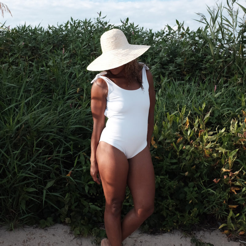 Front view of straight size model wearing Shoulder Tie One Piece in white.