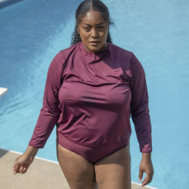 Front view of plus size model wearing Rash Guard in Fig.