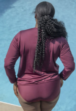 Back view of plus size model wearing Rash Guard in Fig.