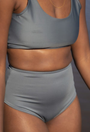 Front view of straight size model wearing Sporty Scoop Top in Storm.