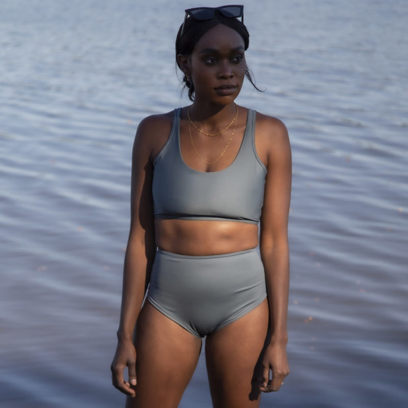 Front view of straight size model wearing Sporty Scoop Top in Storm.