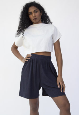 Front view of straight size model wearing Boatneck Crop Top in Oatmeal Linen