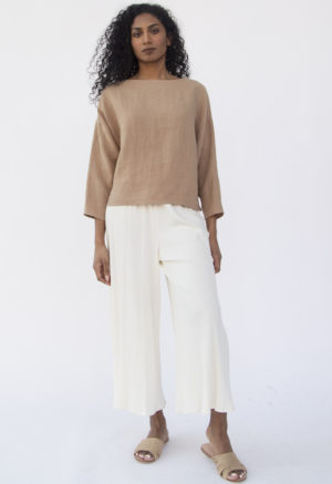 Front view of straight size model wearing Cropped Pullover in Latte Linen.
