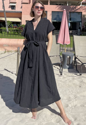 Front view of straight size model wearing Double V Swing Dress in Black Linen.