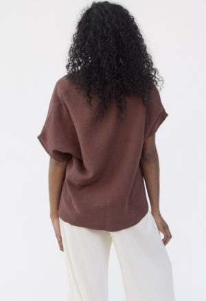 Back view of straight size model wearing Double V Top in Raisin Cotton.
