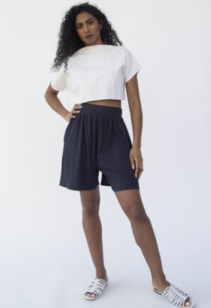 Front view of straight size model wearing Easy Ribbed Short in Navy Rib.
