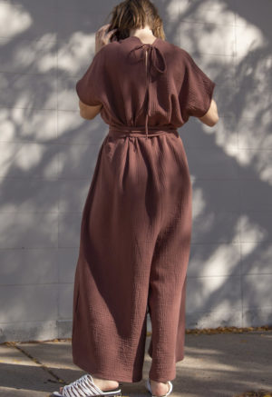 Back view of straight size model wearing Oversized Jumper in Raisin Cotton.