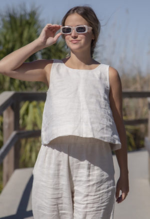 Front view of straight size model wearing Reversible Scoop Tank in Oatmeal Linen.