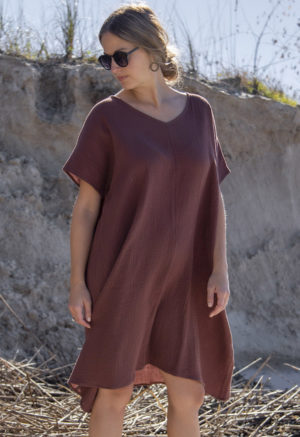 Front view of straight size model wearing Reversible Smock Dress in Raisin Cotton.