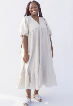 Front view of plus size model wearing Ruffle Midi Dress in Oatmeal Linen.