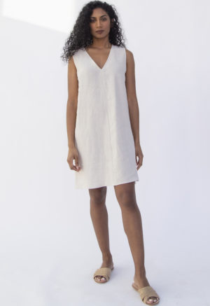 Front view of straight size model wearing Shift Dress in Oatmeal Linen.