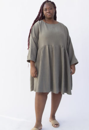 Front view of plus size model wearing Short Oversized Dress in Moss Linen.