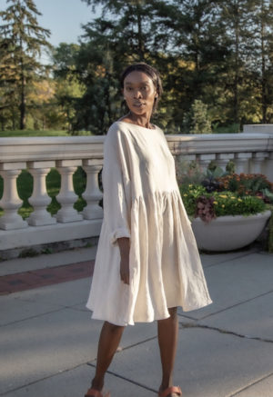 Front view of straight size model wearing Short Oversized Dress in Oatmeal Linen