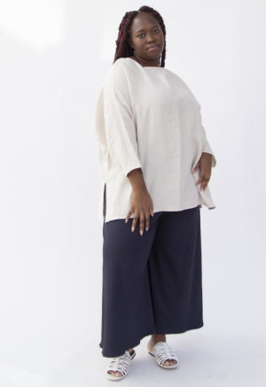 Front view of plus size model wearing Tunic Pullover in Oatmeal Linen.