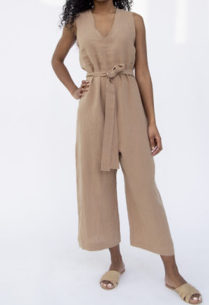 Close up front view of straight size model wearing Wide-Leg Jumper in Latte Linen.