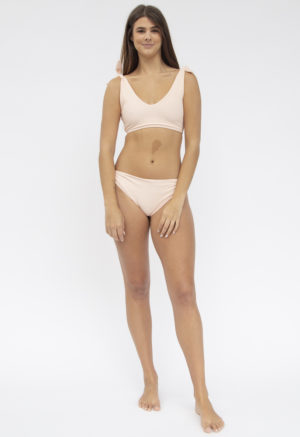 Front shot of straight size model in Shoulder Tie Top and Tie Bikini Bottoms in Petal Pink Rib.