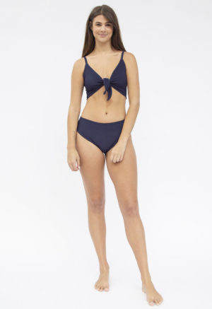 Front shot of straight size model in Two-Way Top and Bikini Bottoms in Indigo Rib.
