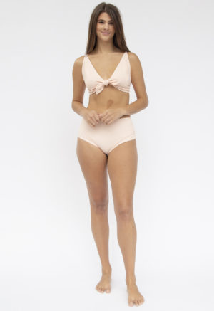 Front shot of straight size model in Tear Drop Tie Top and Hipster Bottoms in Petal Pink Rib.