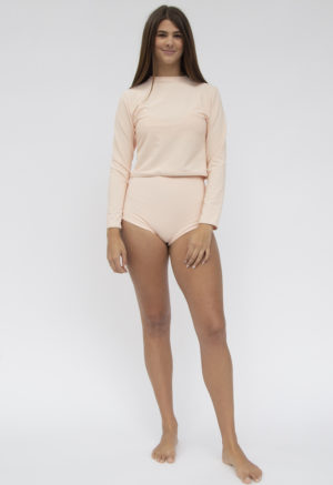 Front shot of straight size model in Cropped Rash Guard and High-Waisted Bikini Bottoms in Petal Pink Rib.