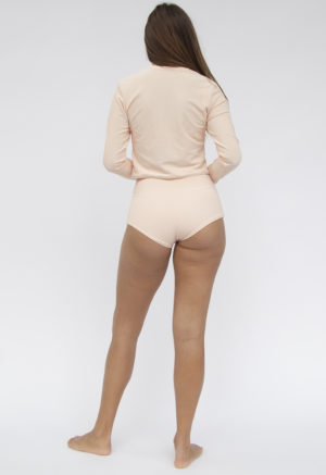Back shot of straight size model in Cropped Rash Guard and High-Waisted Bikini Bottoms in Petal Pink Rib.