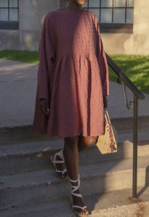 Front view of straight size model wearing Blush Check Short Oversized Dress.