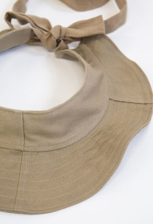 Close-up view of Nomad Tie Visor Hat