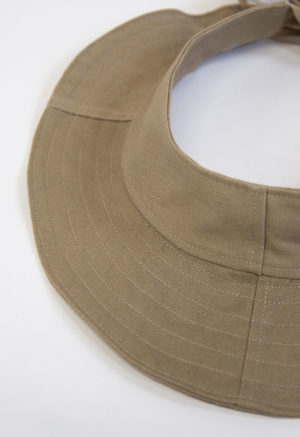 Close-up view of Nomad Tie Visor Hat