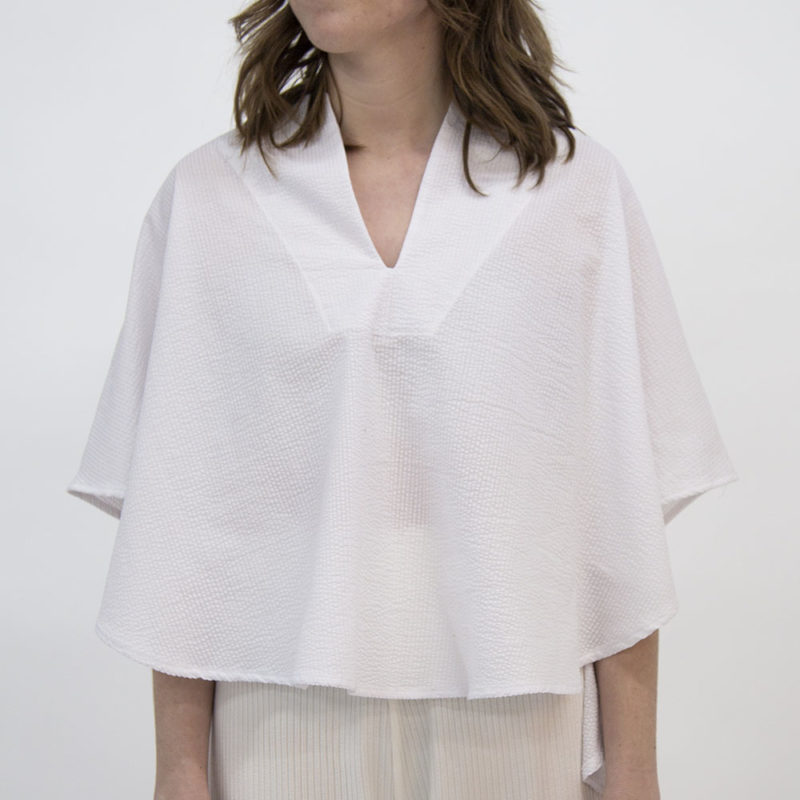 Front view of straight size model wearing White Seersucker Cropped Circle Top.