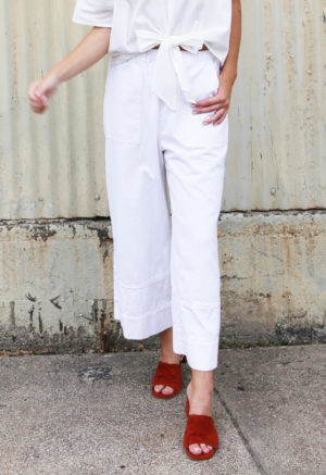 Front view of straight size model wearing White Easy Wide-Leg Pants with Back Pockets.