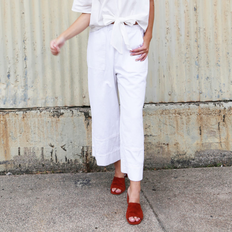 Front view of straight size model wearing White Easy Wide-Leg Pants with Back Pockets.