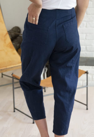 Back view of straight size model wearing Navy Artist Pant.