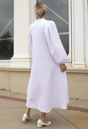 Back view of straight size model wearing White Seersucker High Collar Dress.