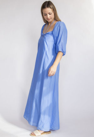 sideFront view of straight size model wearing Cerulean Blue Keyhole Maxi Dress.