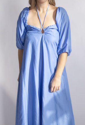 Close-up front view of straight size model wearing Cerulean Blue Keyhole Maxi Dress.