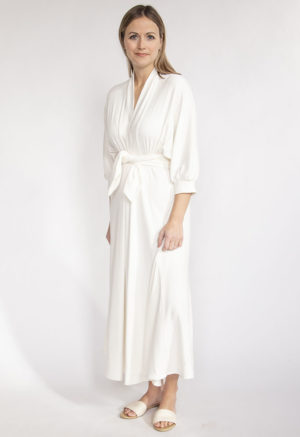 Front view of straight size model wearing Ivory Rib Deep V Maxi Dress.