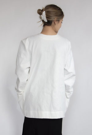 Back view of straight size model wearing White Scoop Neck Jacket.